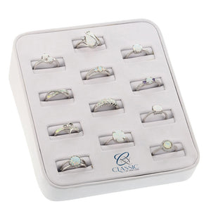 Set of 12 Assorted Rings on a White Leatherette Display - White Opal